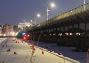 Traffic cones now sitting on the Charles River below the Massachusetts Avenue Bridge