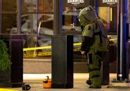 Bomb-squad member with pressure cooker
