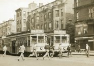Rushing for a trolley in old Boston