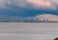 Boston as seen from Swampscott under ominous clouds