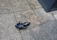 Destroyed sneaker on Boylston Street