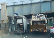 Two trucks under one Storrow bridge