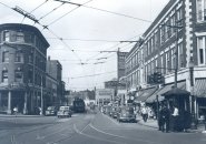 Old street scene with trolley and tracks