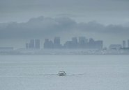 Boston in the fog as seen from Nahant