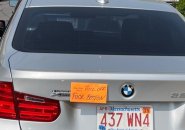 Boston parking ticket with obscene response on a BMW