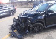 Wrecked car at Readville train station