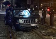 Smashed SUV on Green Line tracks