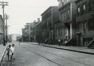 Kids on an empty street in old Boston