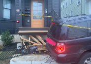 SUV takes off front porch of house on Walk Hill Street