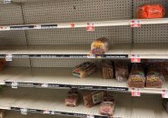 Empty bread shelves at one supermarket
