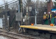 Workers wait for signal to work on signals at Wood Island