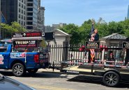 Guy in pickup pulling trailer illustrating how horrible Donald Trump is