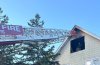 Fire ladder extending to roof at Averton Street fire