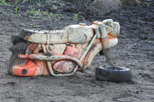 Muddy old dirt bike