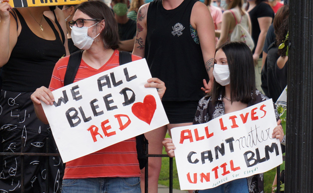 Sign: We all bleed red